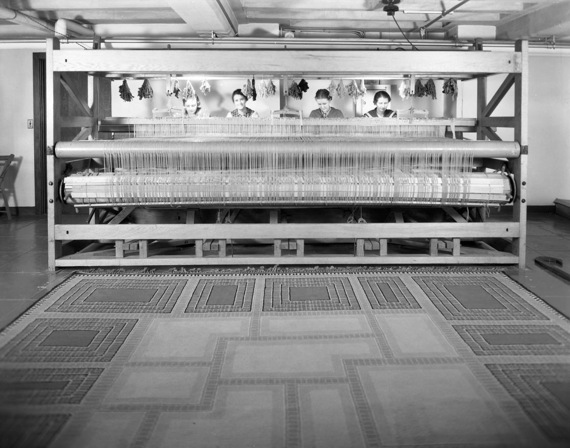 Studio Loja Saarinen weavers Elizabeth Edmark, Marie Bexell, Peggy Broberg, and Gerda Nyberg at a twelve foot loom, c. 1931. Copyright Cranbrook Archives. Studio Loja Saarinen weavers Elizabeth Edmark, Marie Bexell, Peggy Broberg, and Gerda Nyberg at a twelve foot loom, c. 1931. Copyright Cranbrook Archives.