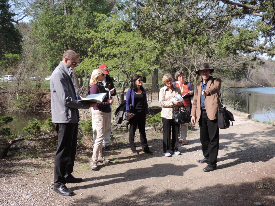 Dr. Kendall Brown of California State University leads a tour of the Cranbrook Japanese Garden for the Center staff and Subcommittee Members Dr. Kendall Brown of California State University leads a tour of the Cranbrook Japanese Garden for the Center staff and Subcommittee Members