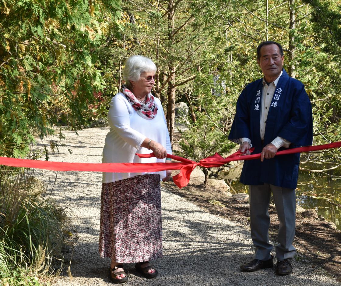 Lily Pond Cascade ribbon cutting ceremony with Master gardener Hiromu Terashita and Center Patron Jeanne Graham Lily Pond Cascade ribbon cutting ceremony with Master gardener Hiromu Terashita and Center Patron Jeanne Graham